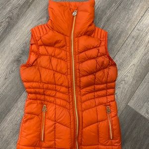 Orange down filled Michael Kors vest